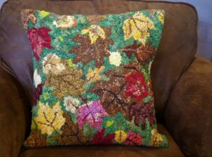 Linda Raether -- pillow case from wool yarns, roving, silks, and wool yardage